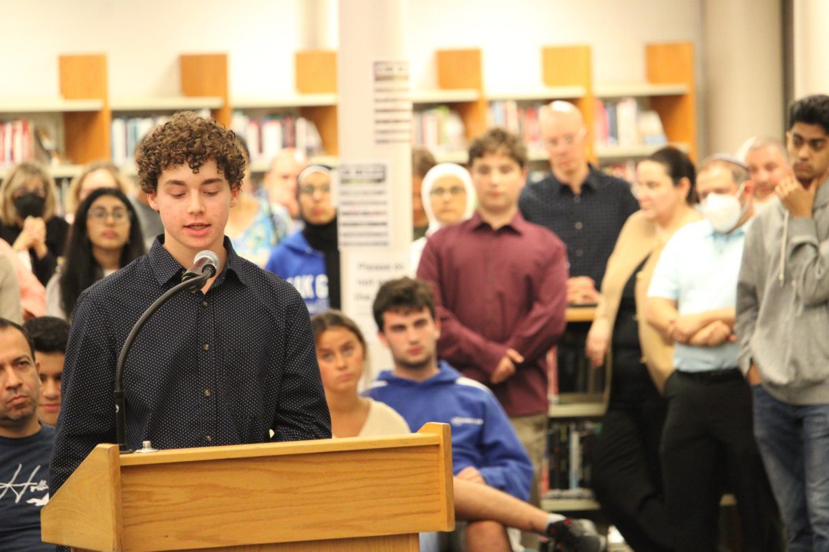 Sophomore Andy Trob speaks out against the operation calendar at the Sept. 26 board meeting. Trob said “[he] would have to do school work on a body that was hungry and a mind that was tired” if the non-attendance day for Yom Kippur was removed (Photo credit: Alex Clark)