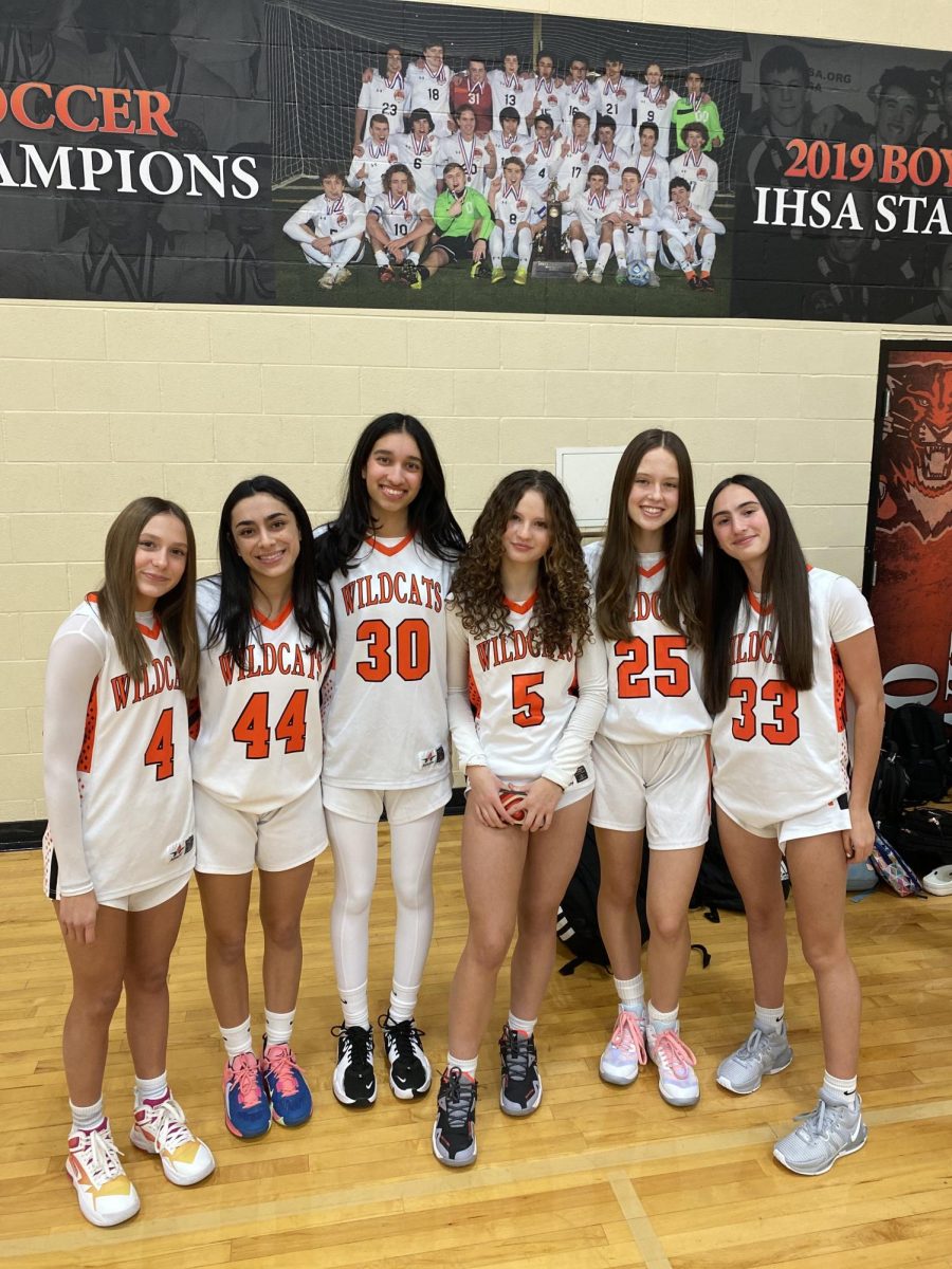 [Left to right] Freshmen Isabella Losh, Christina Karahalios, Nazneen
Iqbal, Ainsley Ecton, Rylie Danforth and Julia Garrison rhave fun playing
basketball for LHS together. Although the basketball season has only just
begun, it is something many students are looking forward to watching as
they support their fellow peers.