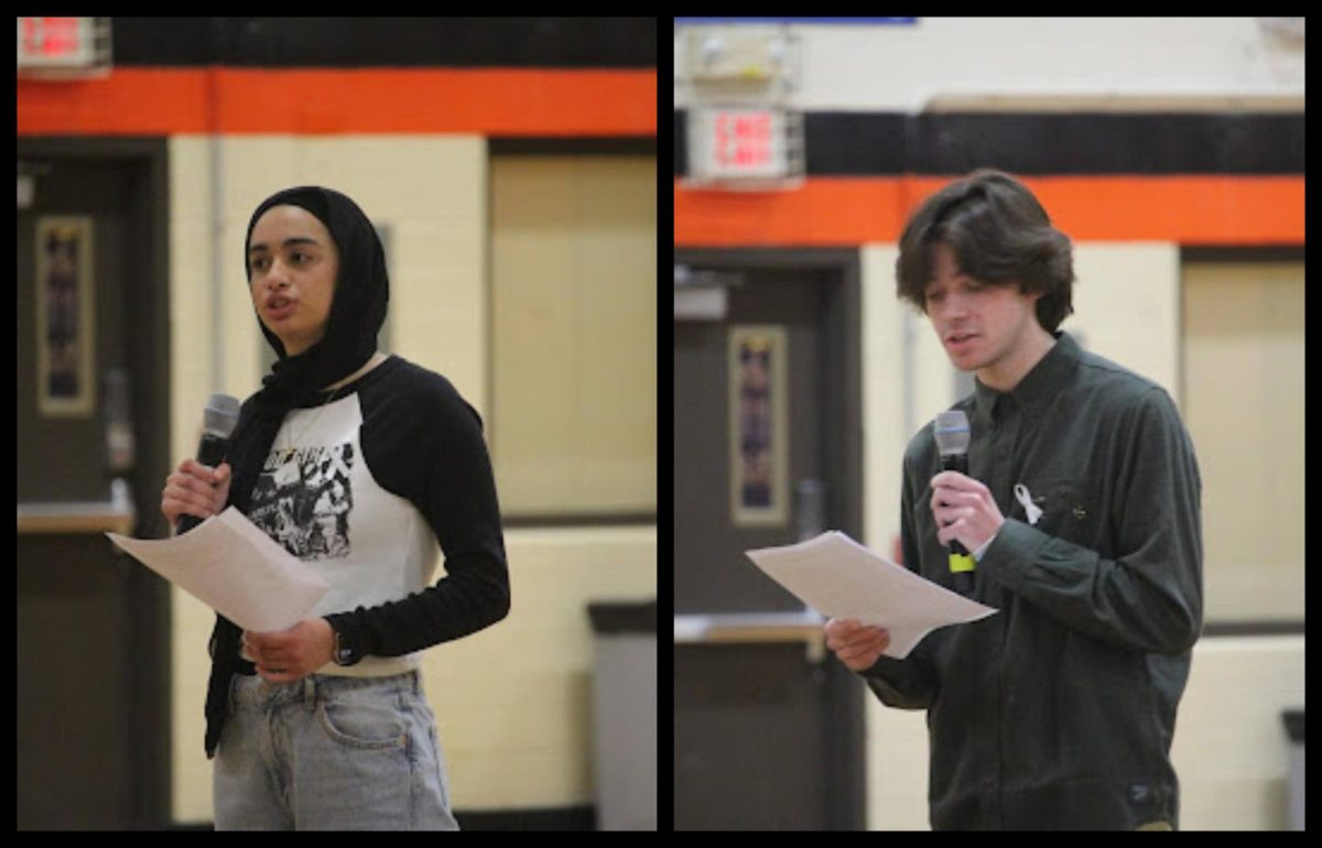 Senior Jana Badawi and junior James O’Keeffe speak at the peace rally in the main gym. They organized the event together and promoted it on their personal Instagram accounts, along with flyers being posted around the school. 