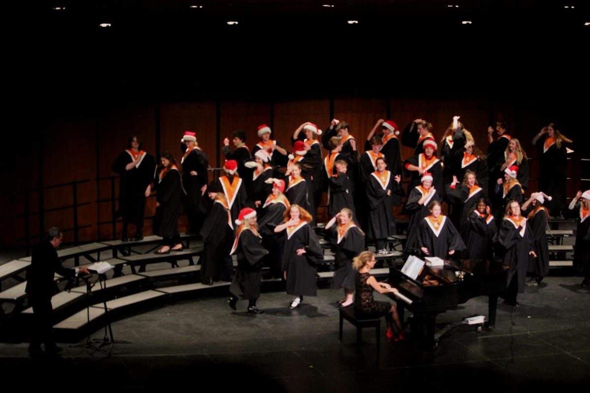 The Concert Choir sings “Do A Little Good” from “Spirited,” performing a short dance number to complement it. “[The class of 2024] always had a tradition for doing some sort of dance number, choreographed by [seniors] Yvie Gaiden [and Katie Baker], ever since our sophomore year,” senior Charlie Tomlinson said. “The dance was silly, and I had a lot of fun.”
