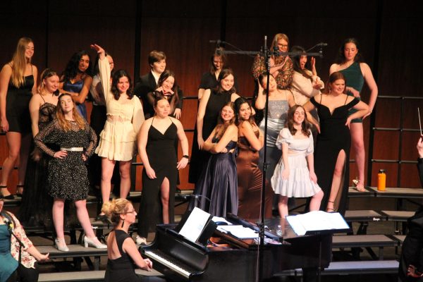The Bel Canto choir, the junior choir, performs “Ex-Wives” from “SIX.” “We started [preparing], pretty much right after the Holiday concert,” junior Delaney Rybicki said. Caption by Ash Magalhaes