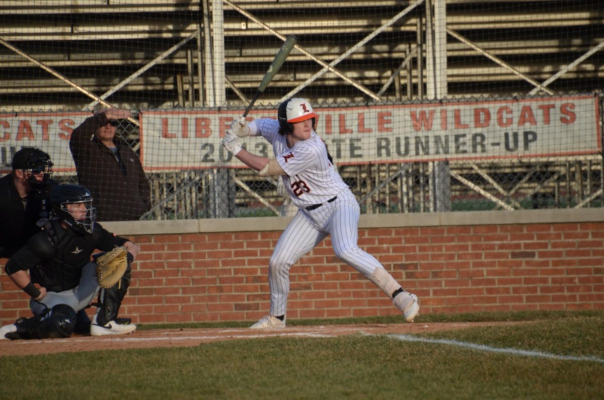 Junior Quinn Schambow (23) steps up to bat. Schambow, who recently committed to Oklahoma State University, bats, catches and pitches for the Wildcats. Schambow made it home to secure the team’s fifth run in the fourth inning. 