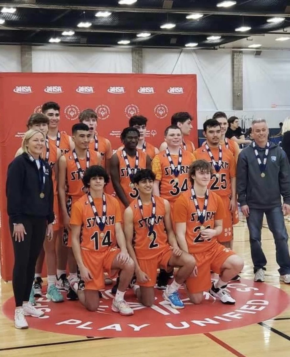 On Saturday, March 11, the D128 Special Olympics basketball team wins state at the Unified High School State Tournament Basketball Championship in Champaign, Ill. The head coach for the Unified team is Deborah Beagle and the LHS athletes are seniors Zach Henderson, Jack Wasser, Haziel Morales and Xavier Granados, and juniors Parker Nuttall and Ty Schiff. (Photo courtesy of District 128). 
