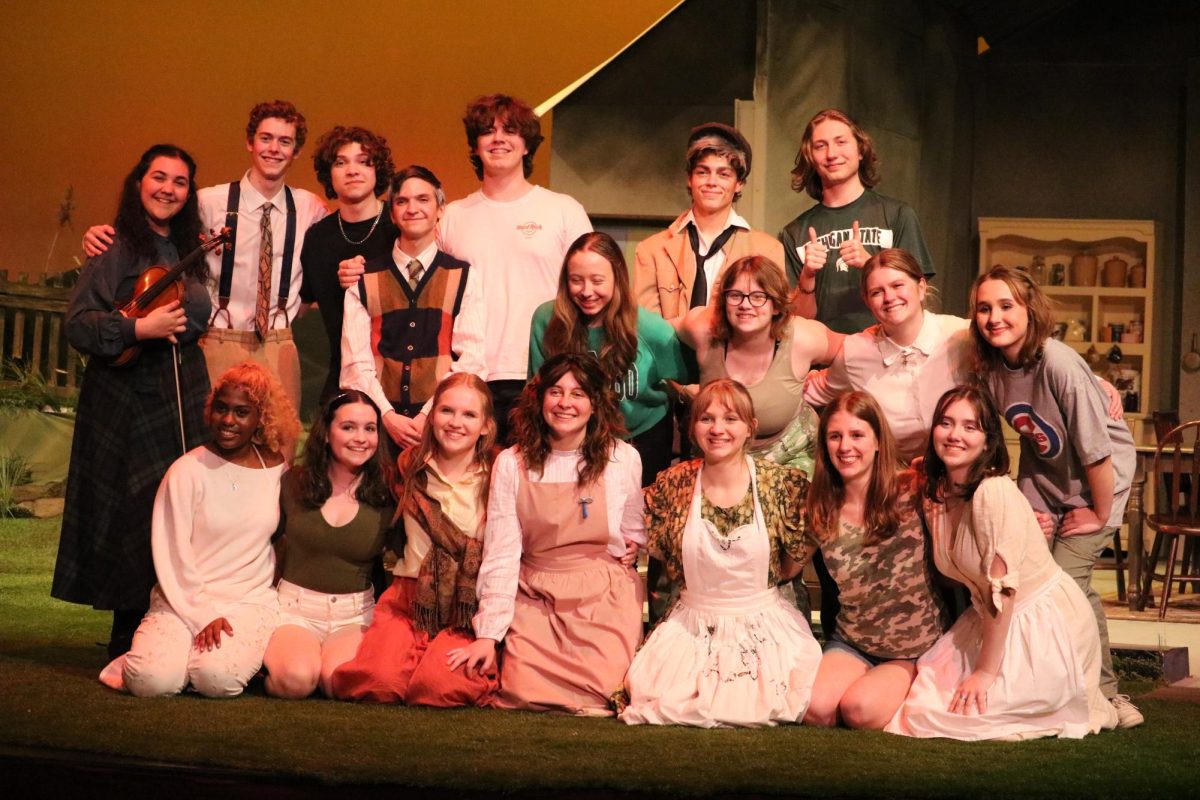 Both casts pose with student director Olivia Morgan for a group picture, following the production’s final dress rehearsal on Wednesday, April 17. There were four shows over the next three days, including two on Saturday, April 20.