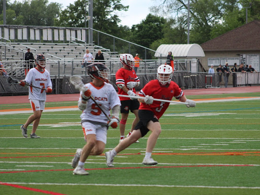 Boys lacrosse wins first playoff game against Grant