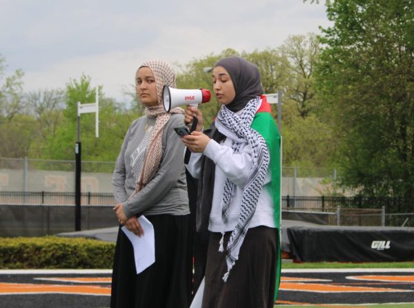 Junior Jana Abdelrahman and Mai Asad give speeches to raise awareness about the Israel-Palestine conflict and the damages incurred by Palestine. Around 60 students attended the walkout, choosing to miss the first half of their third period class.