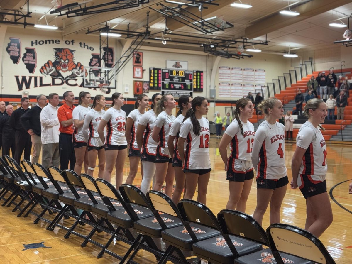 The varsity girls' basketball team stood strong during the pre-game national anthem. At the end of the anthem, the opposing team began singing and chanting the lyrics.