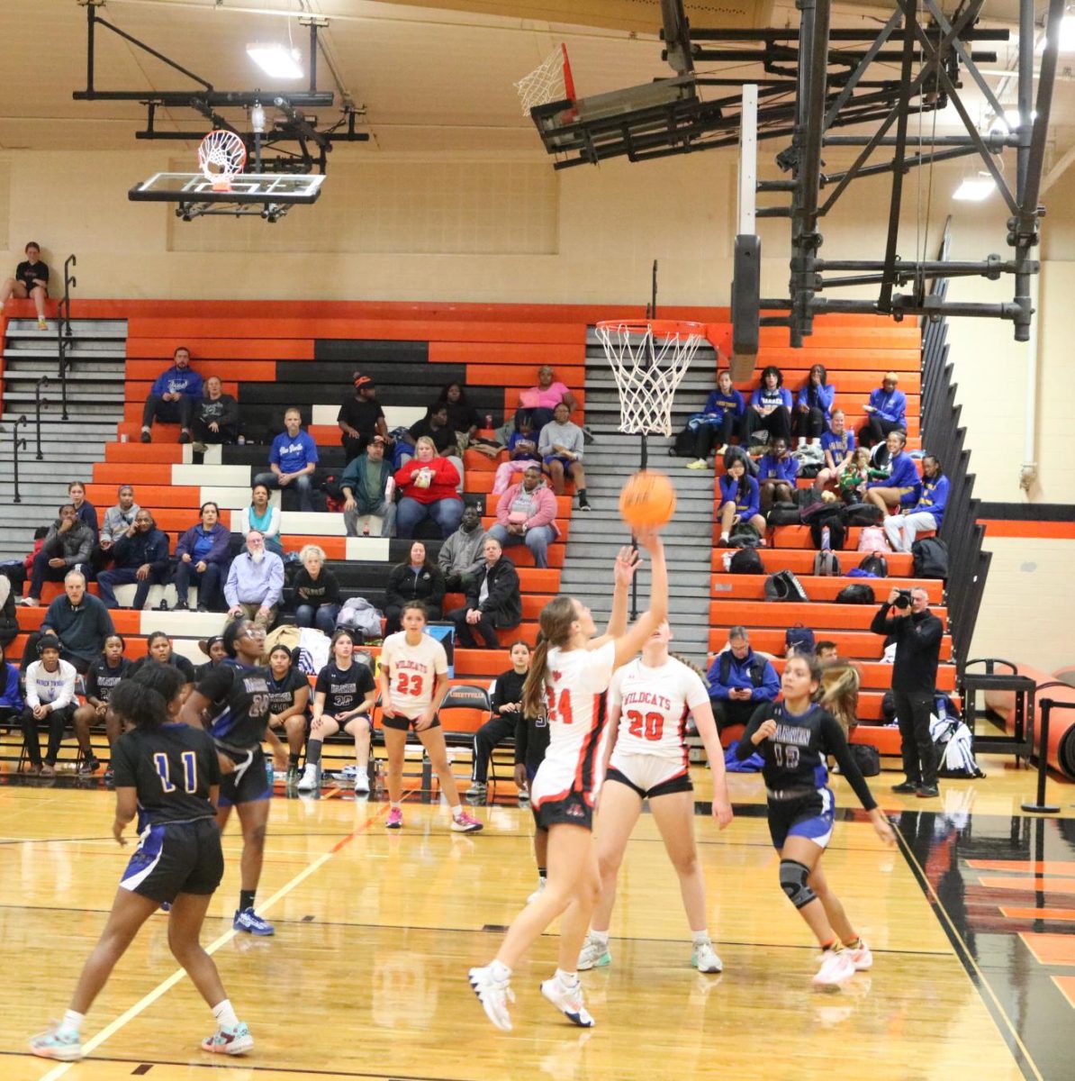 Junior Caitlyn Griffith (24) goes for a layup in the second quarter. After the game, Coach Pedersen said, “Caitlin does all the things that people don't really notice. She plays with defense, she boxes out, she rebounds, she shares the ball with her teammates.”
