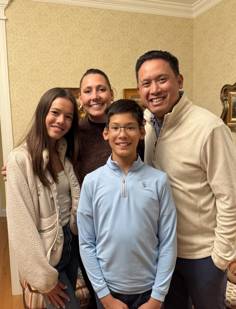 Mr. Chung poses for a photo with his wife and kids. After graduating from LHS in 1999, he worked for companies such as Disney and Moringstar before going into real estate. “That high degree of excellence [that LHS has] certainly translates into your college years as well as into your career,” he said. (Photo courtesy of Mr. Chung)