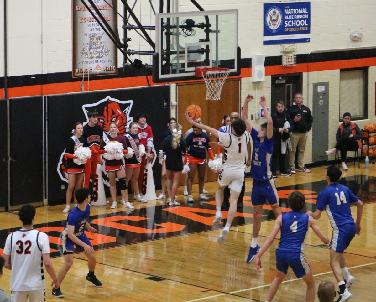 Senior Point Guard Liam Hanson (1) goes for a layup in the third quarter of the game against the Scouts this past Tuesday, February 11, 2025.