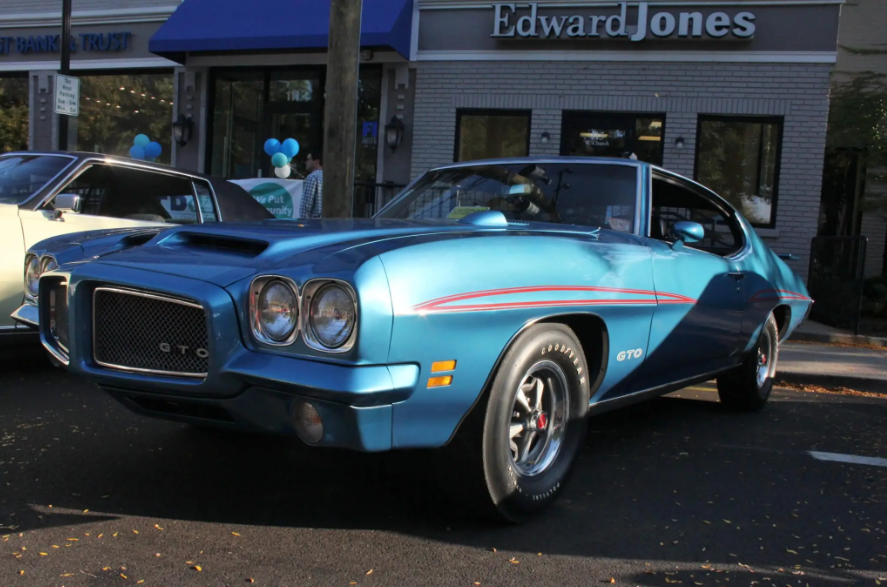 A Pontiac GTO parked on Church Street during Car Fun on 21 parked along with many other classic, retro and vintage cars. During the show, owners park their vehicles on Cook Ave, Church St, an down Route 21 every third Wednesday from May to September. (Photo Courtesy: Mainstreet Libertyville)