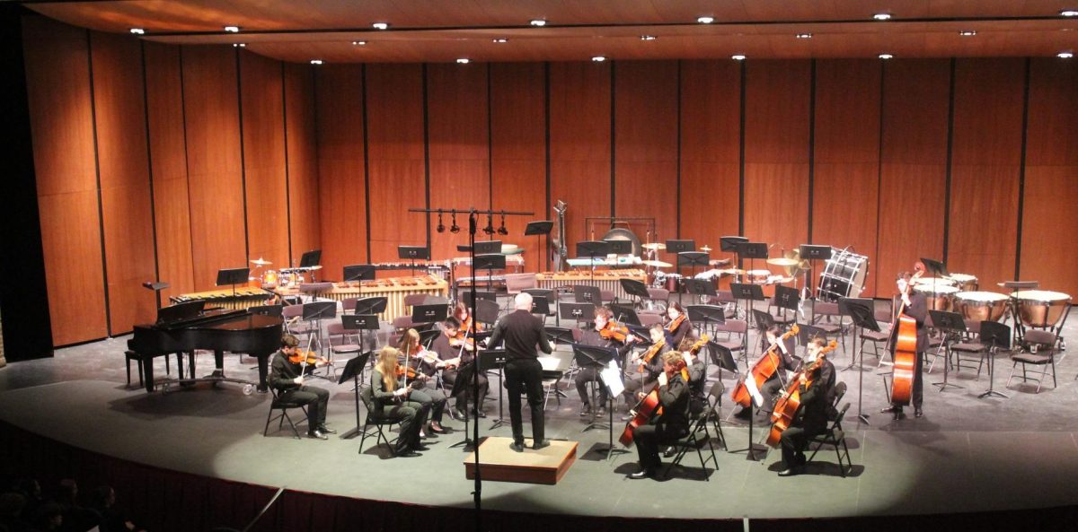 Mr. Jeremy Marino, the Orchestra director, leads the Concert Orchestra – the freshman string ensemble – in “Fire Dance,” written in 2007 by Soon Hee Newbold. The spirited and syncopated tune features intense string playing and clear rhythm throughout.
