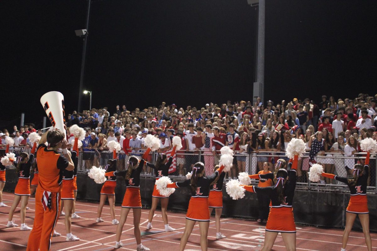 The cheerleaders hype up the USA themed student section during the first quarter. The cheerleaders led the crowd on the classic Defense chant.