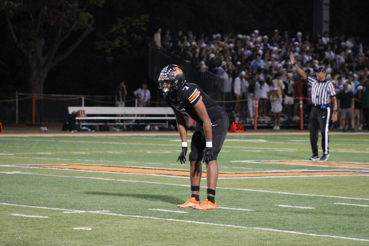 Senior defensive back and wide receiver Nick Ori (7) prepares for the play during the second quarter. Ori shone as one of the star players of the game. “Team spirit is high right now. Personally, I’m new to the team but it feels like I’ve been here training with these guys for years," Ori said. "Feelings pre-game are confident and laid back but also focused on the greater goal and that’s winning.”
