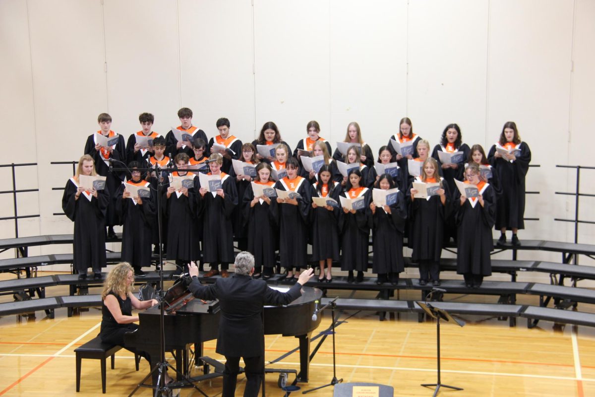 The Concert Choir sings Dr. Brown’s favorite piece of the night, “Zigeunerleben” by Robert Schumann. Senior Marley Herchenbach said, “I like it because it's very vocally challenging, but also just fun. It's a fun tune.”

