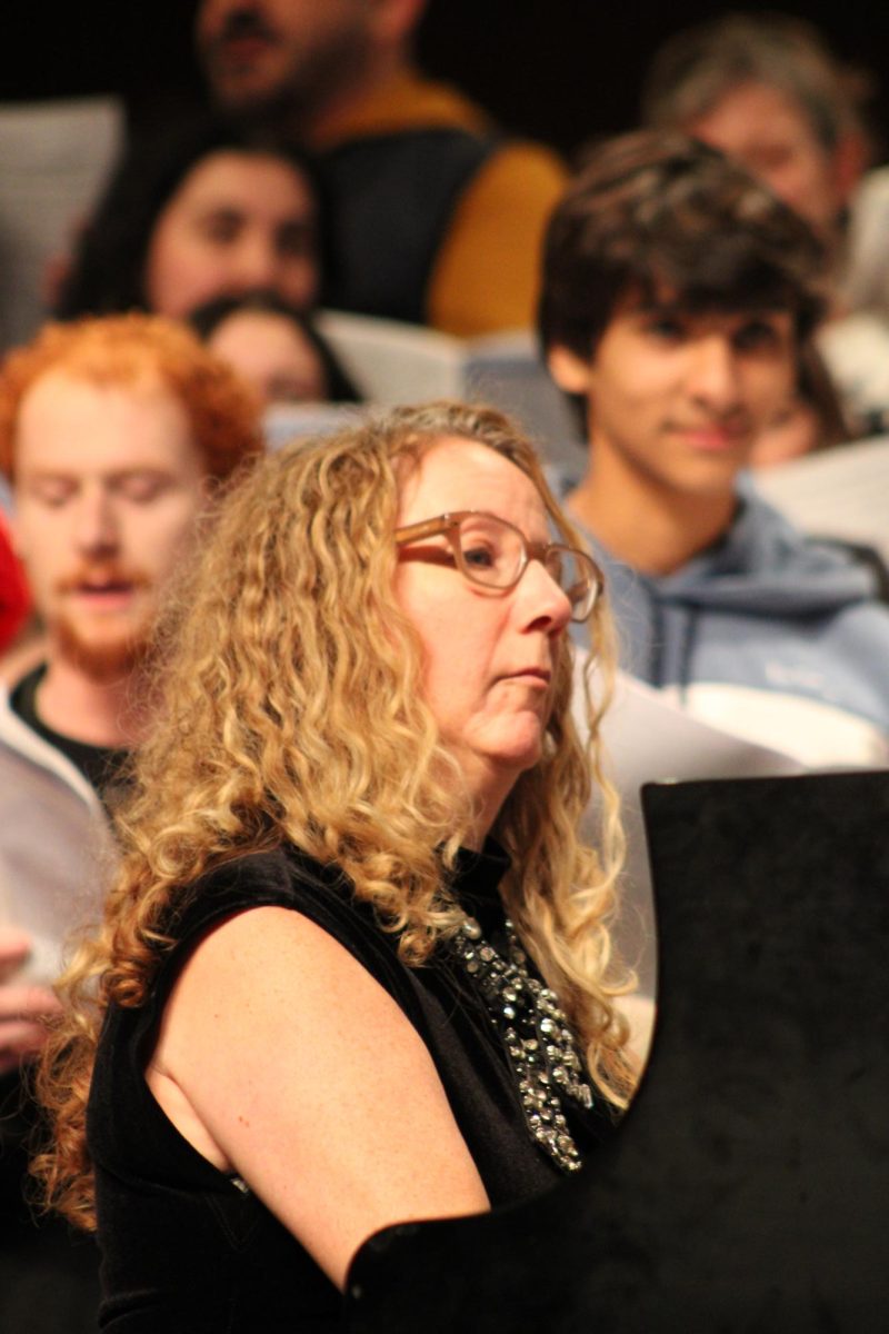 Ms. Claire Birmingham masterfully performs the chorus of "Hallelujah" on piano. Ms. Birmingham is the Collaborative Pianist who works hand-in-hand with Dr. Brown as they guide each performance.