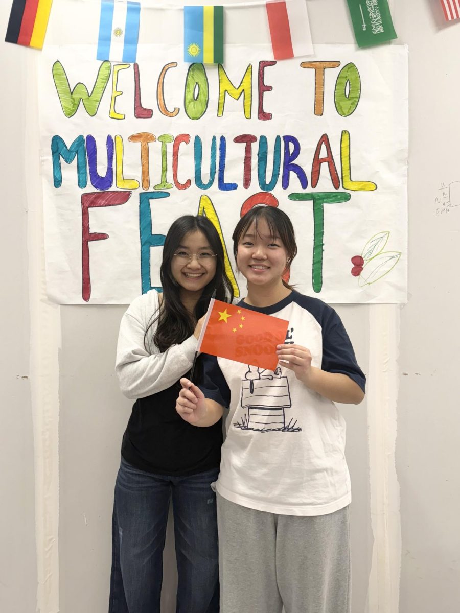 Seniors Angela Xiao and Vivian Wang celebrate their Chinese heritage at the annual Multicultural Feast, an event showcasing cultural cuisines from across the globe.