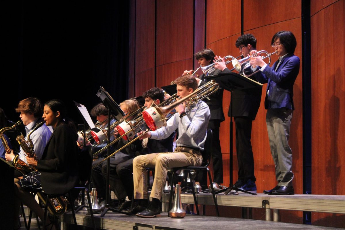 Trombonists from the LHS Jazz ensemble utilize bucket mutes to manipulate their sound to fit the needs of the piece. The mute creates a softer and smoother tone that blends with the band. 