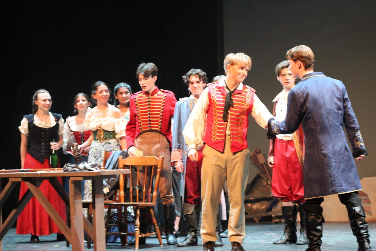 In Oct. 2025, the LHS theater department put on a production of the classic musical Les Misérables. Pictured here are both company selectees for All State Theater production, Newsies: junior Michael Bowman and sophomore Nate Wagner. In Les Misérables, their characters come together to fight in the French Revolution.