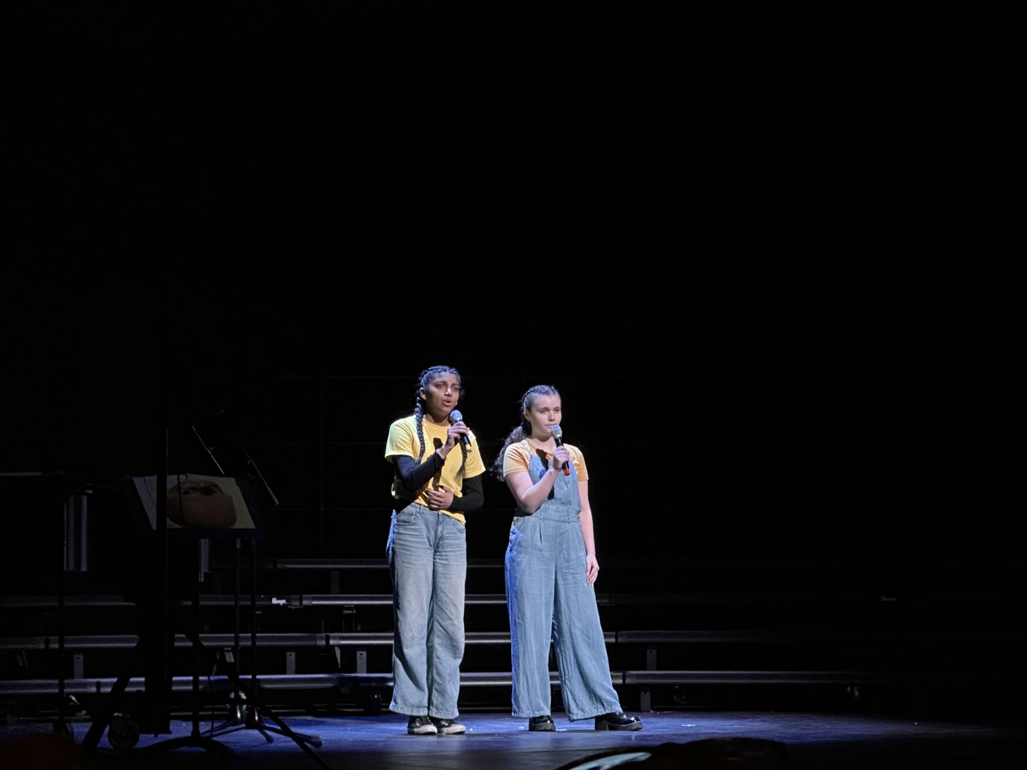Juniors Addi Sriram and Veronica Seely are pictured singing In "His Eyes" from "Jekyll and Hyde." They are both members of the Bel Canto Ensemble.