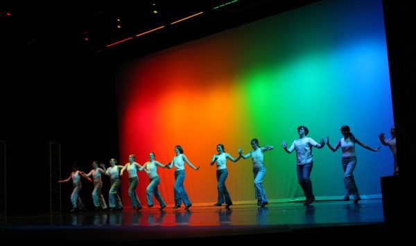 Dancers take the stage in Ignite the Floor, an upbeat and energetic number choreographed by Cecily Hamburg.